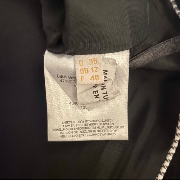 CRiSCA Black Peplum Skirt With Varied Fabric Details Size GB 12 - Picture 11 of 11